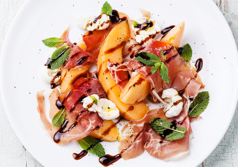 Meloen gewikkeld in Parmaham